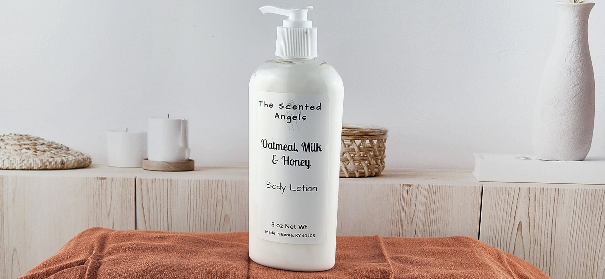 oatmeal honey body lotion front on towel