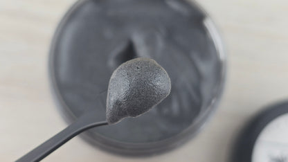 Activated Charcoal 2-in-1 Face Mask and Wash on spatula up close