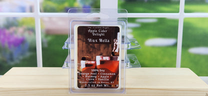 Wax melt packaging with a blurred outdoor background