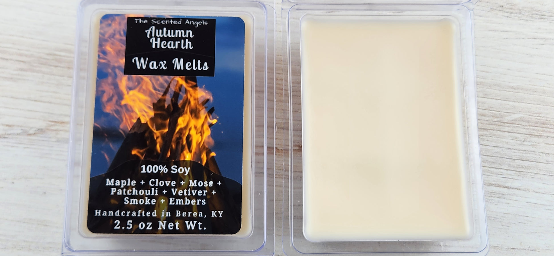 Wax melt with packaging labeled 'Autumn Hearth Wax Melts' on a wooden surface.