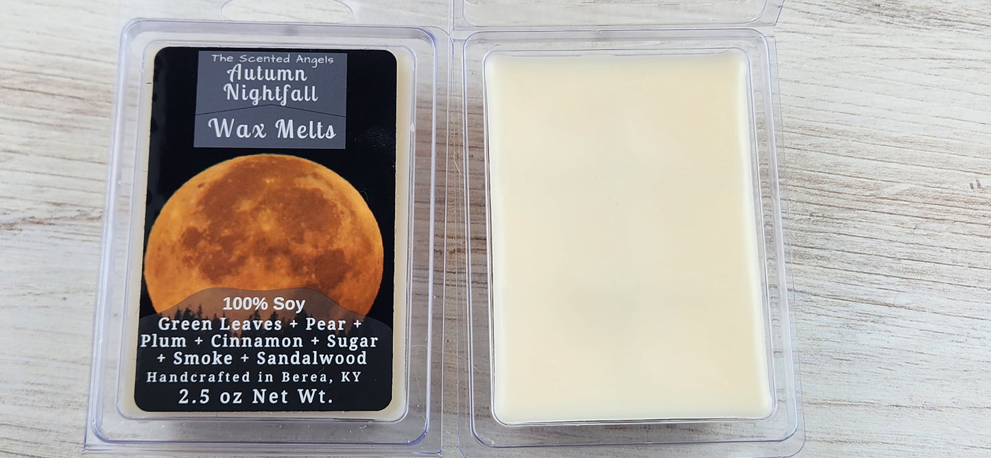 Wax melt packaging with a moon illustration and product details on a wooden surface