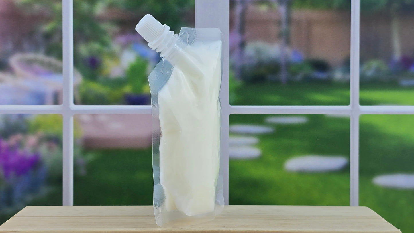 squeezable wax melt pouch on wooden surface