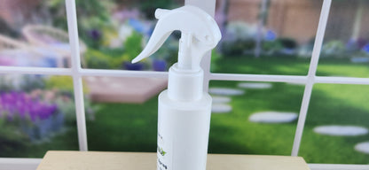 Berry Absinthe Odor Eliminating Spray up close of child lock