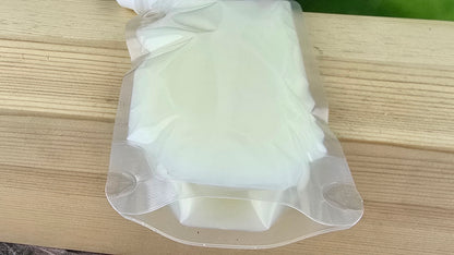 close up of back of squeezable wax melt pouch