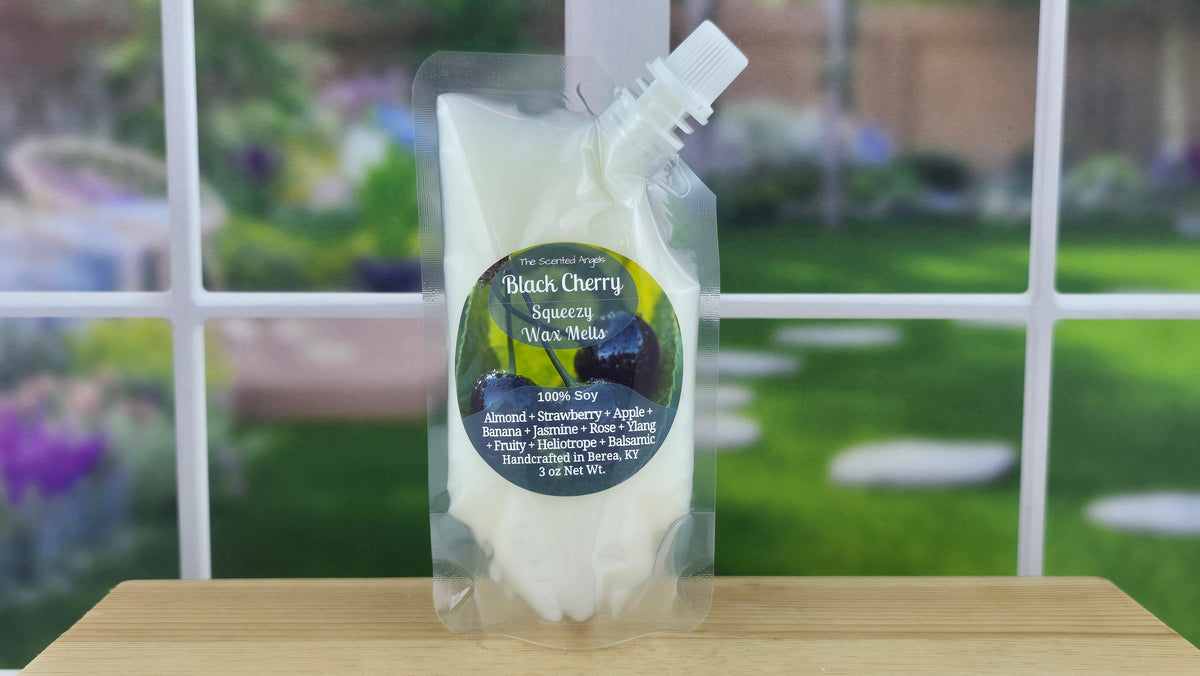 Black Cherry handmade wax melts by The Scented Angels available in clamshell and Squeeze Wax™, featuring a rich fruity fragrance with notes of almond, strawberry, apple, banana, jasmine, rose, ylang-ylang, heliotrope, and balsamic.
