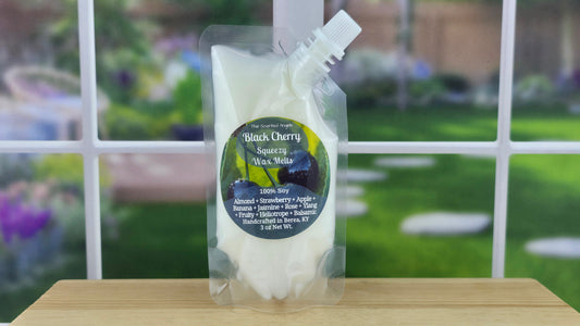 Black Cherry handmade wax melts by The Scented Angels available in clamshell and Squeeze Wax™, featuring a rich fruity fragrance with notes of almond, strawberry, apple, banana, jasmine, rose, ylang-ylang, heliotrope, and balsamic.