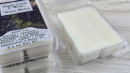 opened woody scented clamshell wax melt