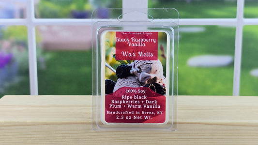 Wax melt packaging with a label on a wooden surface