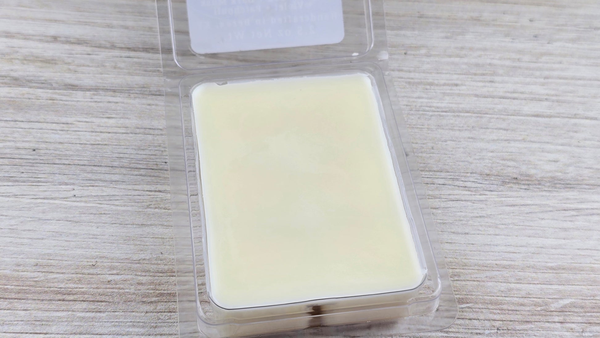 close up of clamshell wax melt packaging