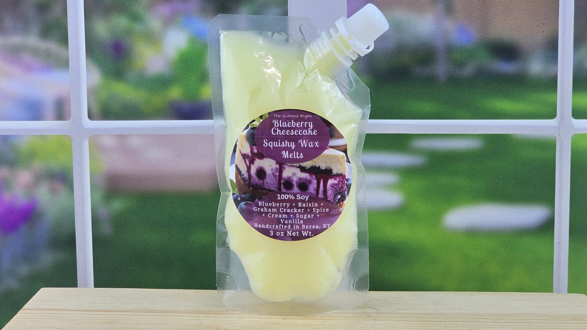 squeezable wax melt pouch on wooden surface