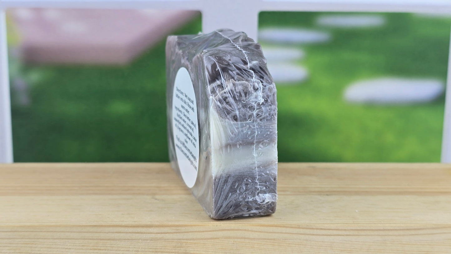 Handmade Bourboned Tobacco vegan artisan soap by The Scented Angels featuring natural cream and brown artisan swirls in a small-batch handcrafted bar.