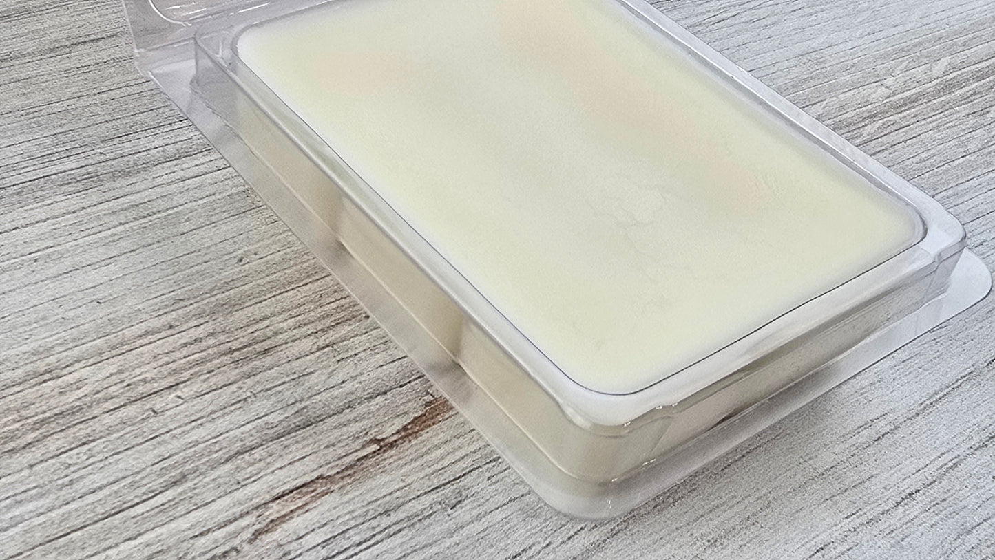 close up of butterscotch clamshell wax melt opened package