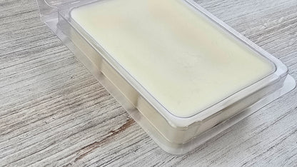 close up of butterscotch clamshell wax melt opened package