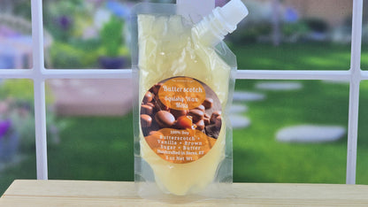 Packaged product with a label on a wooden surface and blurred outdoor background