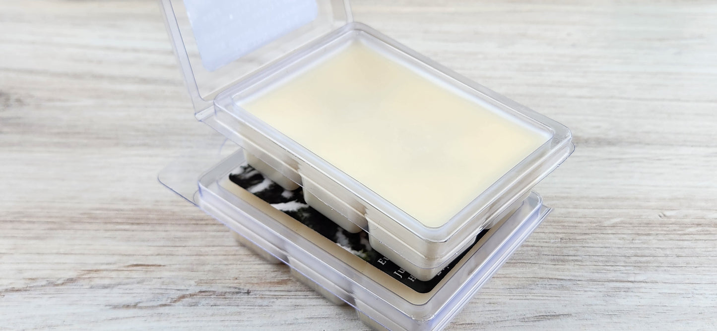 wax melt packaging stacked with one open