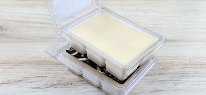 wax melt packaging stacked with one open