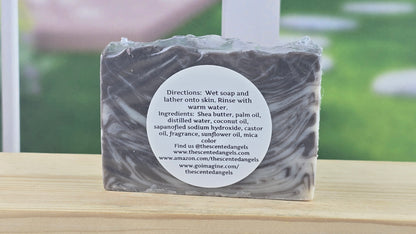 Bar of soap with a label on a wooden surface