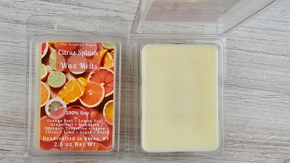Citrus splash wax melts packaging with a wax melt on a wooden surface