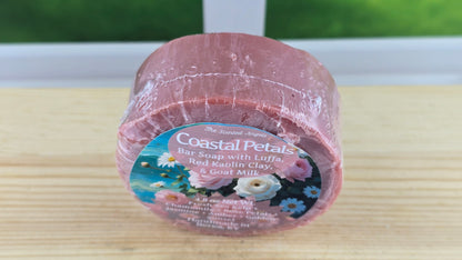 Bar of soap with a label on a wooden surface