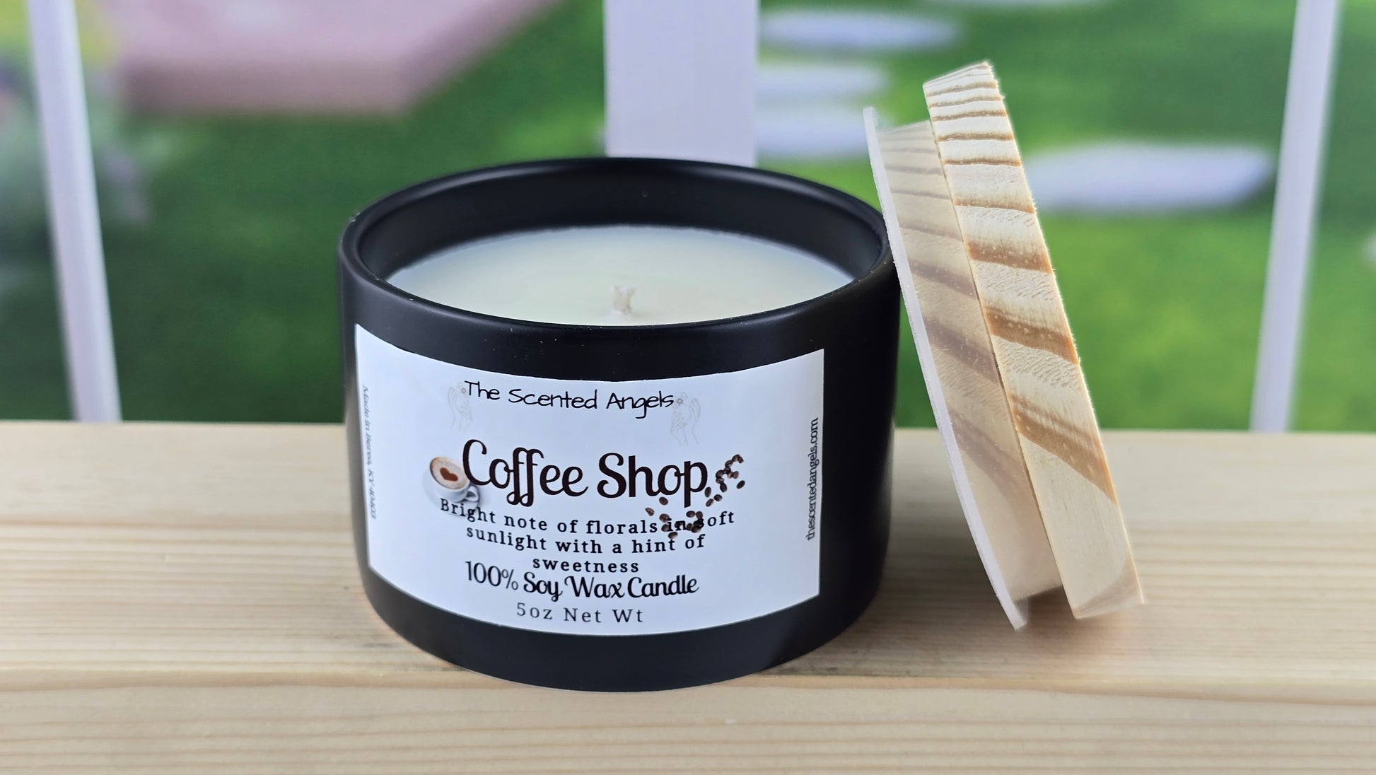 Open Coffee Shop Soy Wax Candle, accompanied by a hand-cut pine wood lid, set on a wooden surface with a bright background.