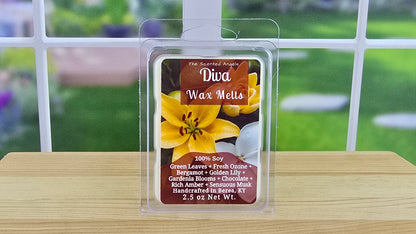 Diva-inspired handmade wax melts by The Scented Angels in clamshell and Squeeze Wax™, featuring bergamot, golden lily, gardenia, chocolate, rich amber, and sensuous musk.