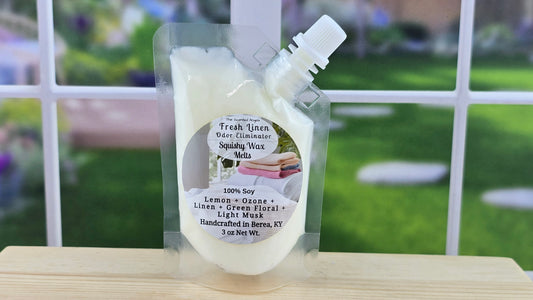 A clear plastic pouch containing white wax melts with a white nozzle, labeled as Fresh Linen Odor Eliminator, 100% Soy Squeezy Wax Melts - 3 oz.