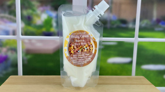 Fruity Cereal handmade wax melts by The Scented Angels in clamshell and Squeeze Wax™, featuring juicy orange, ripe berries, tangerine, and sweet sugary vanilla inspired by Fruity Pebbles.