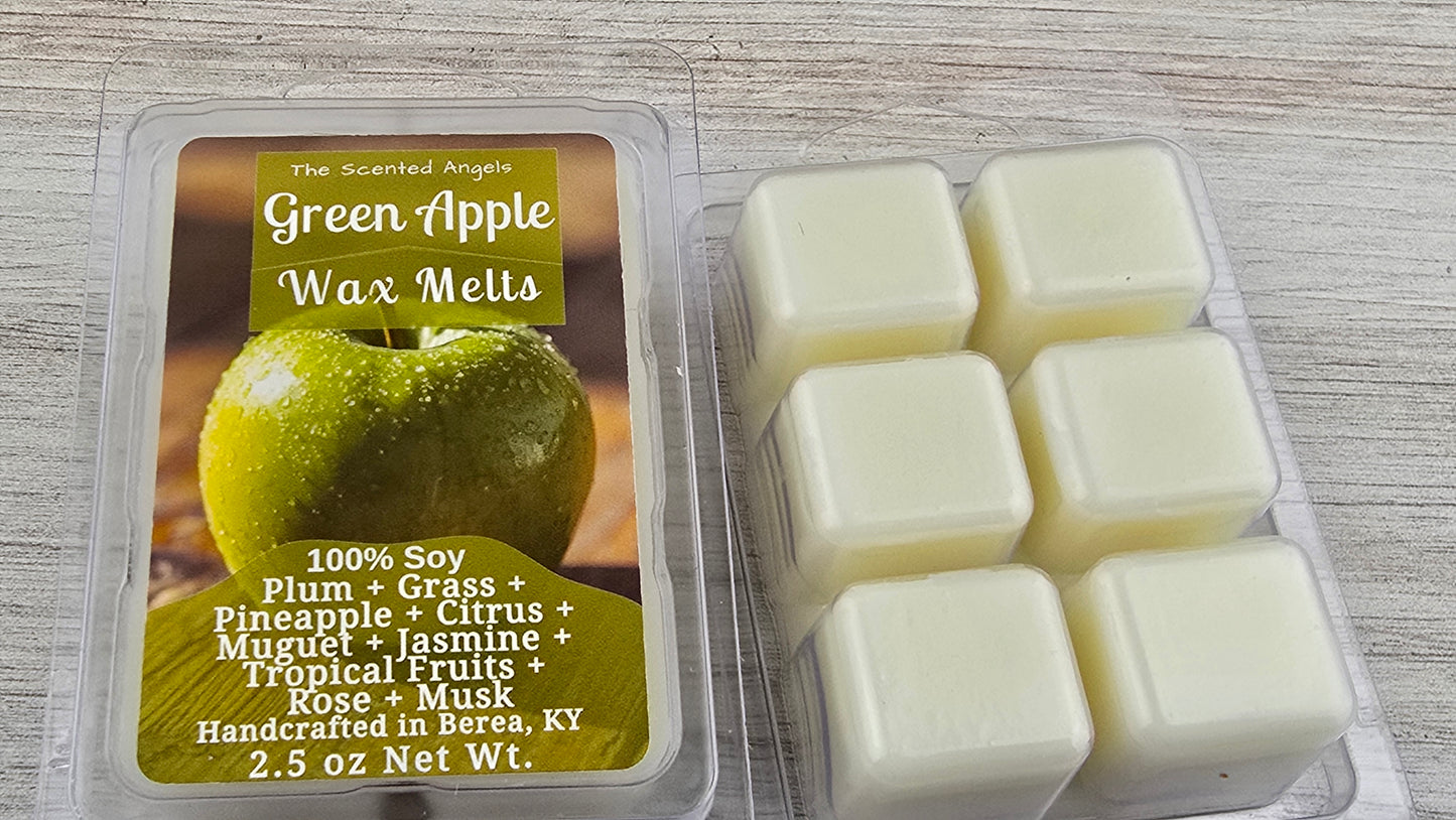 Green Apple wax melts packaging with wax melts on a wooden surface