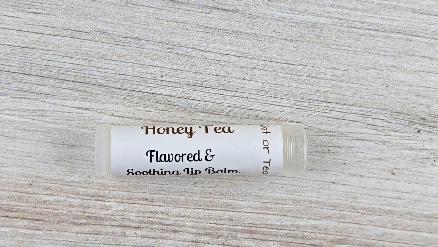 Honey Tea lip balm on a textured surface