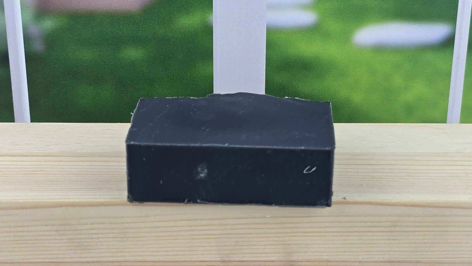 bottom view of handmade Kiss Me In The Dark Cold Process Soap