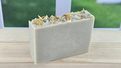 Lemon Essential Oil Bar of soap on a wooden surface