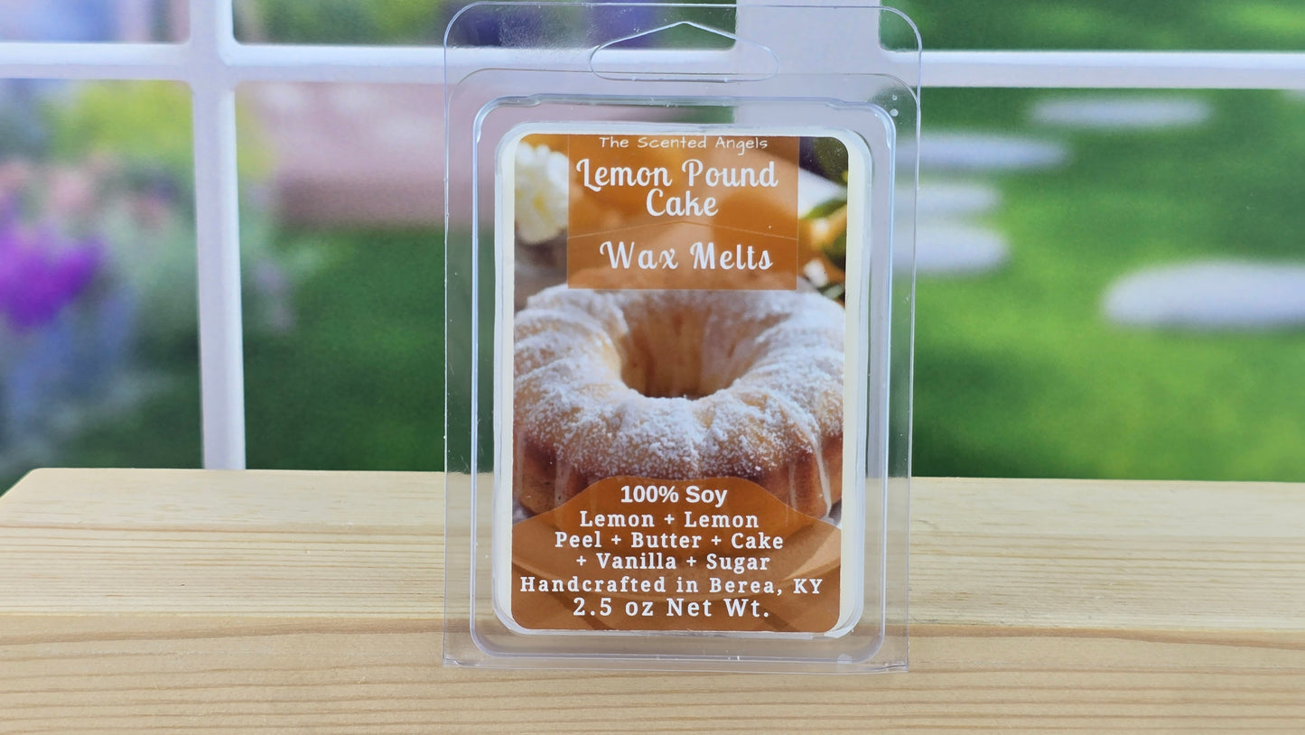 Packaged lemon pound cake wax melts on a wooden surface with a blurred outdoor background.