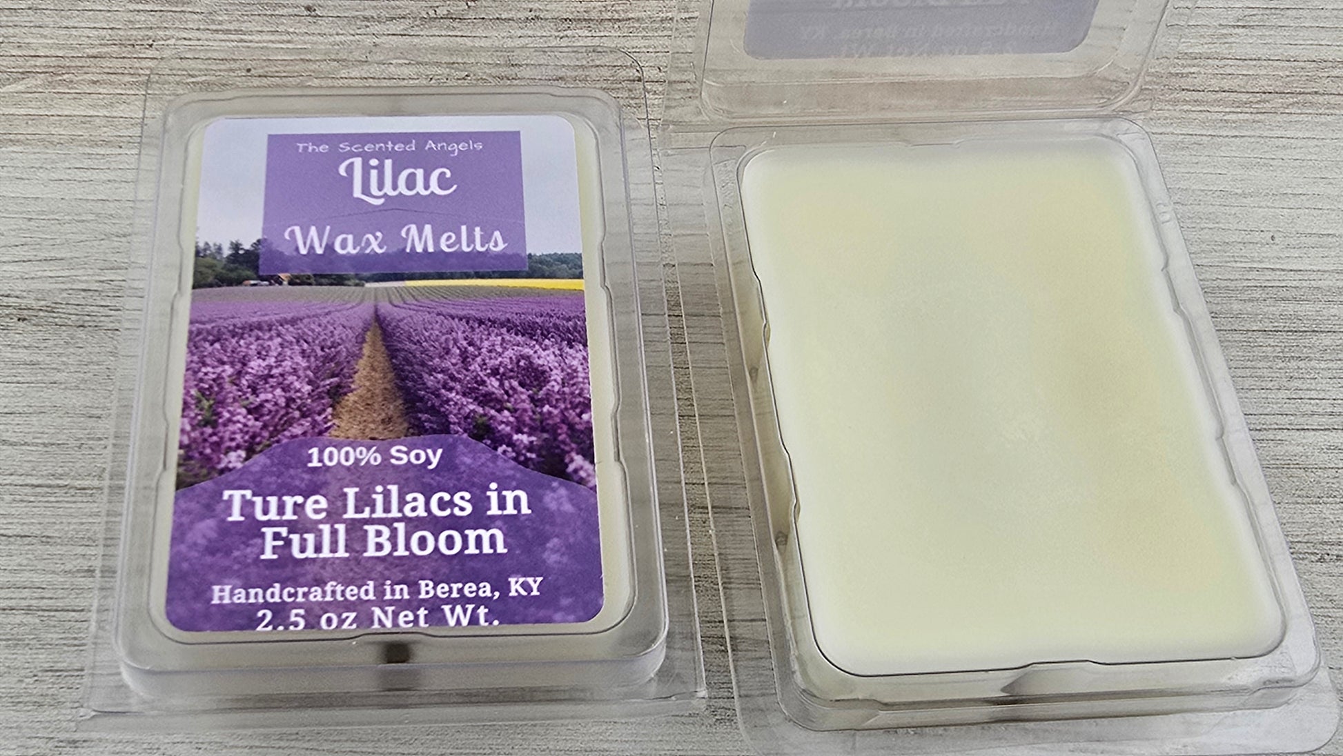 Lilac wax melt packaging with a purple label on a wooden surface