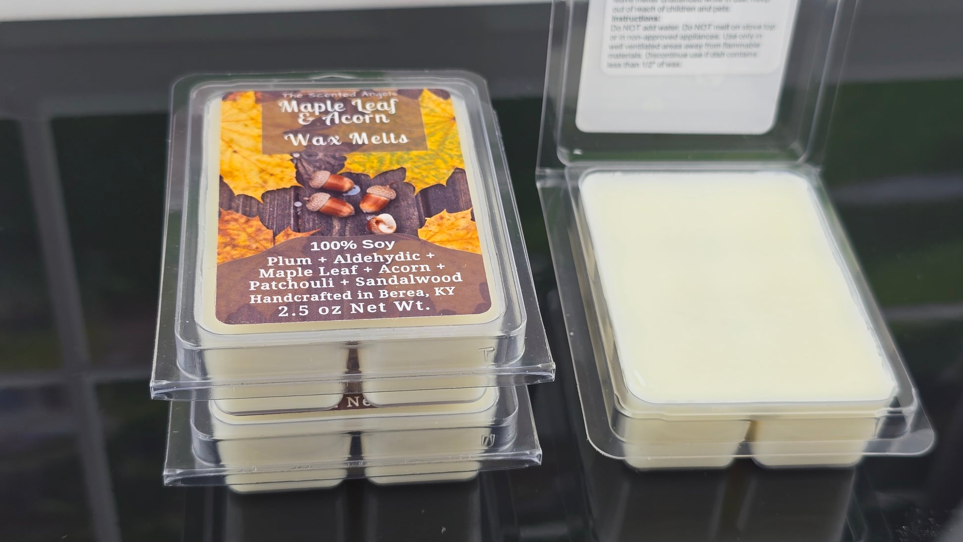 Packaged wax melts with a label on a dark background