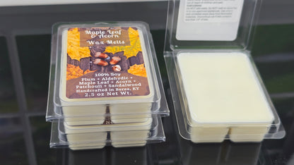 Packaged wax melts with a label on a dark background