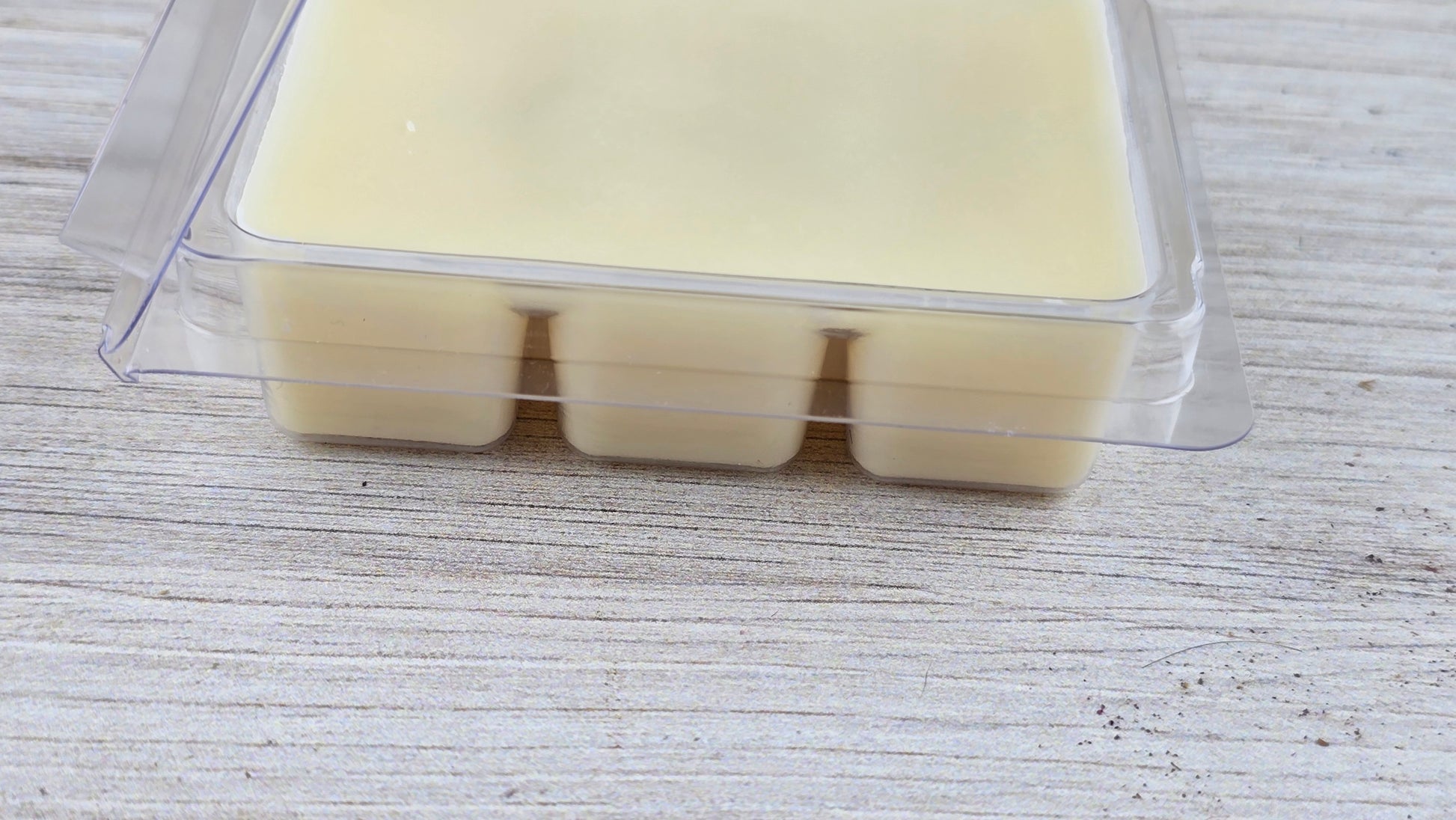 close up of opened clamshell wax melt