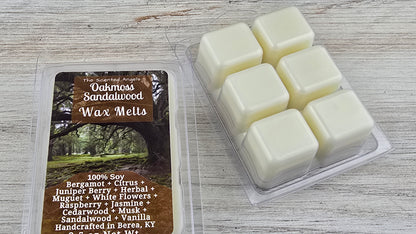 Pack of Oakmoss Sandalwood wax melts on a wooden surface