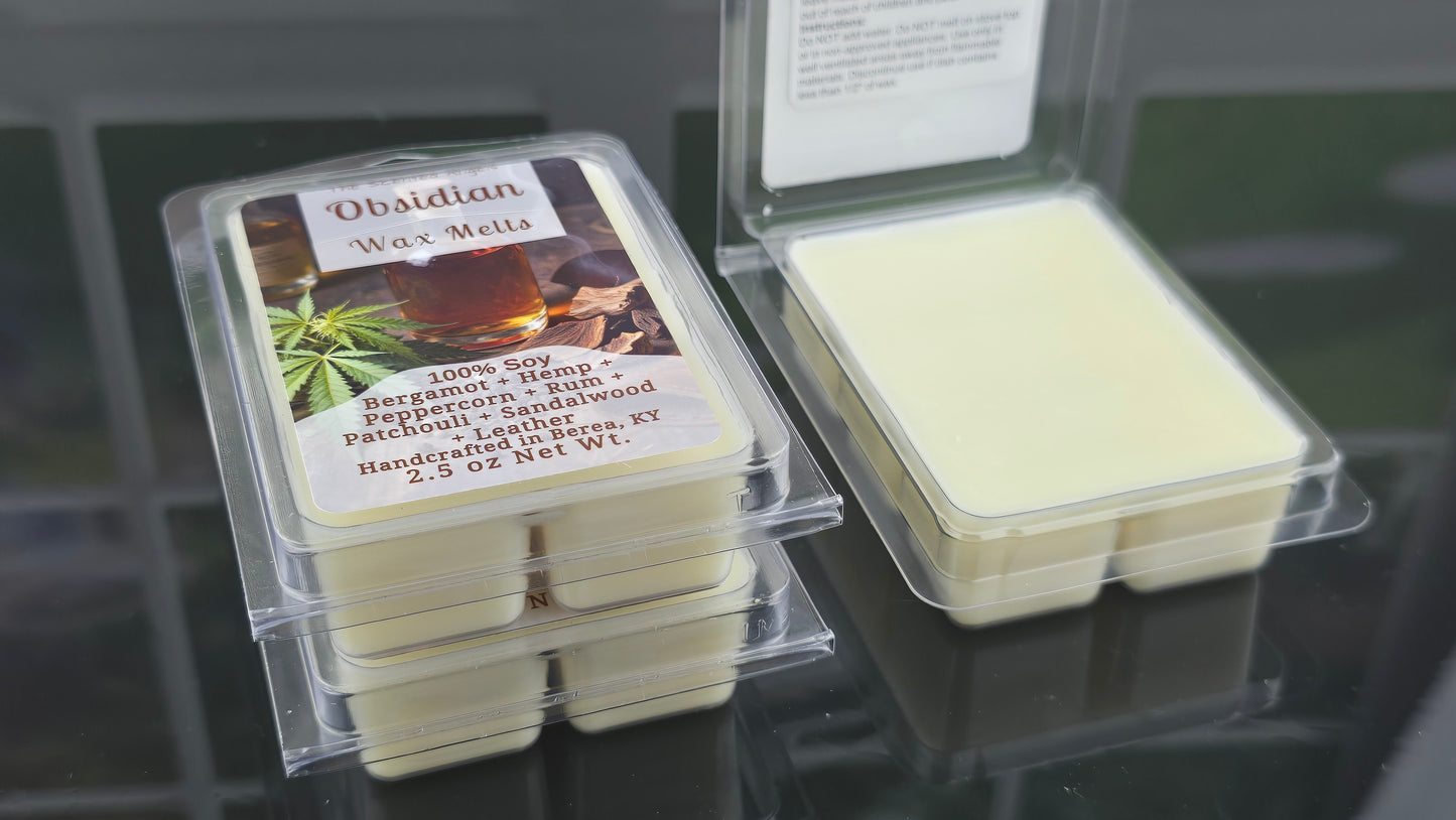 Packaged wax melts with a visible label on a reflective surface
