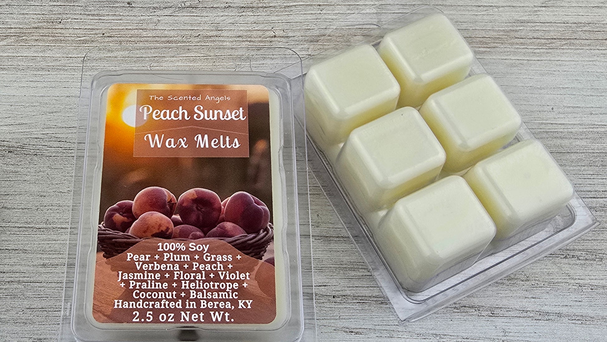 Peach Sunset wax melts packaging with wax melts on a wooden surface