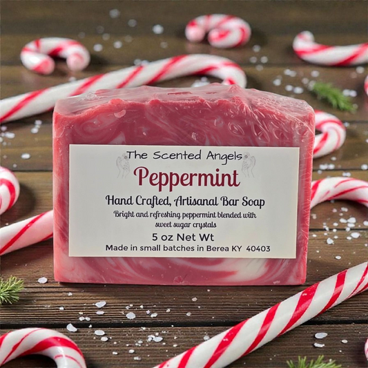 Peppermint soap bar with candy canes on a wooden background