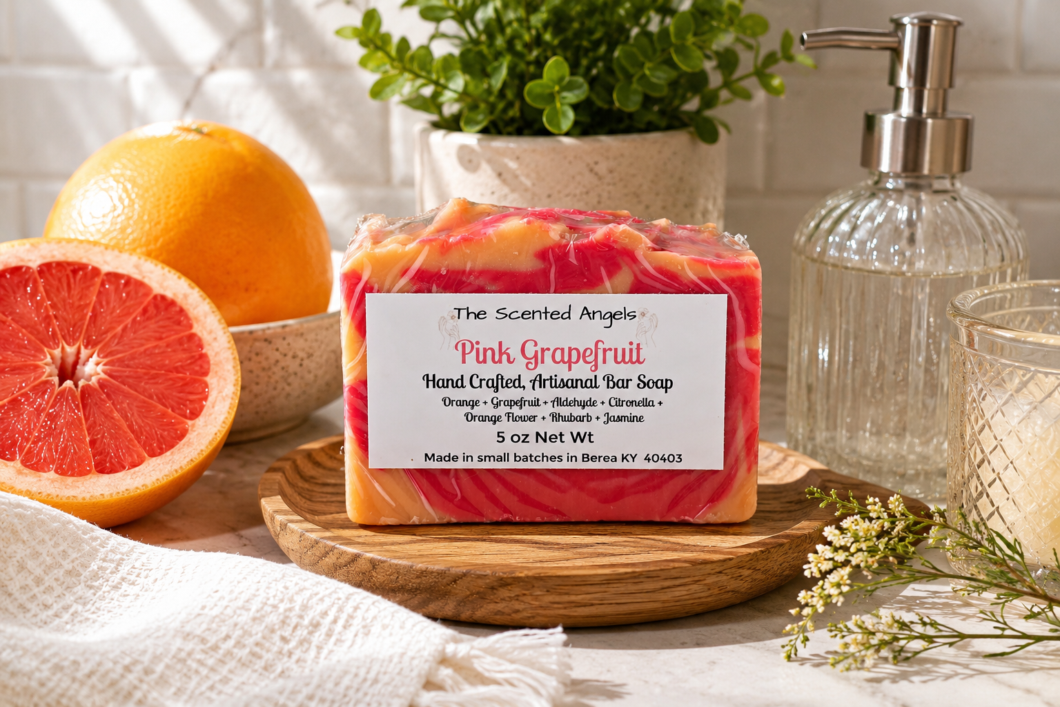 Handmade Pink Grapefruit vegan artisan soap with orange, grapefruit, rhubarb, orange flower, and jasmine. Small-batch soap by The Scented Angels.