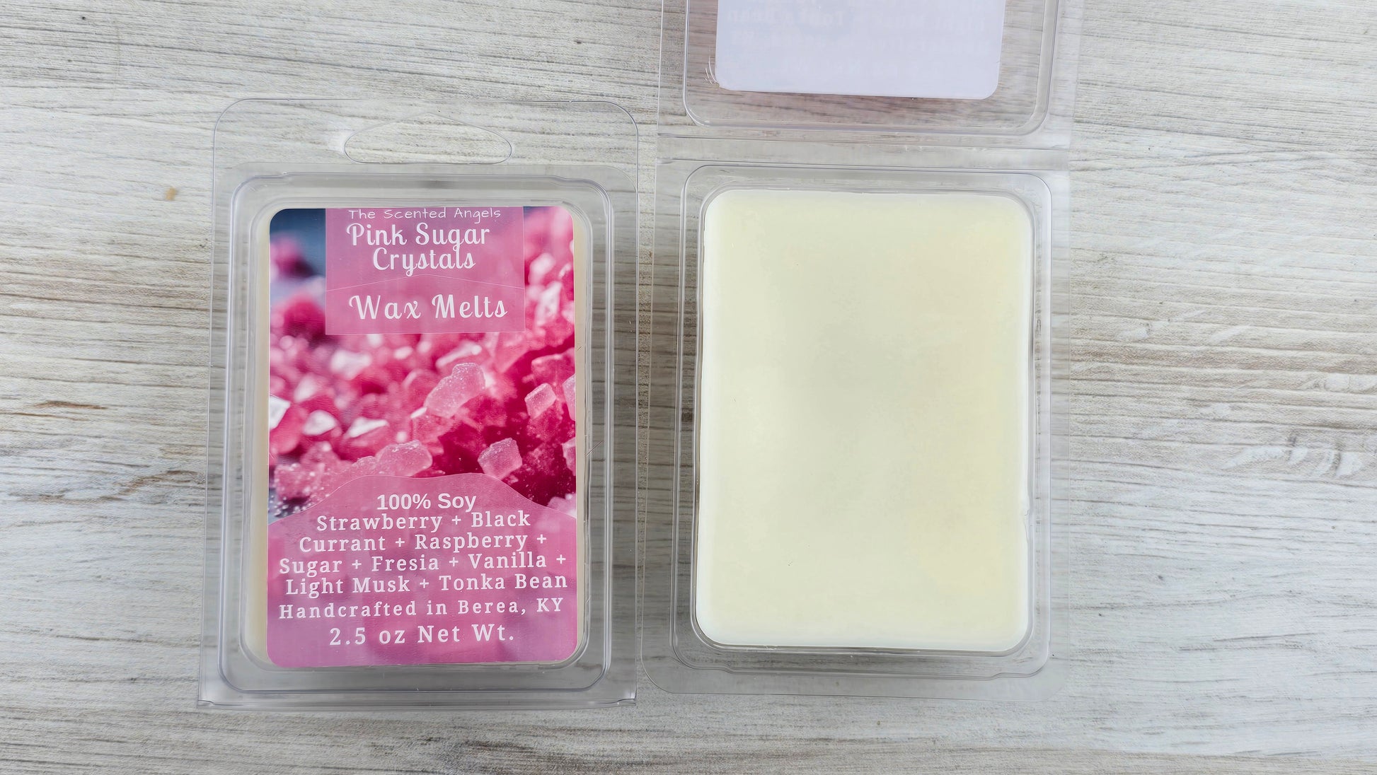 Pink sugar crystals wax melts packaging on a wooden surface