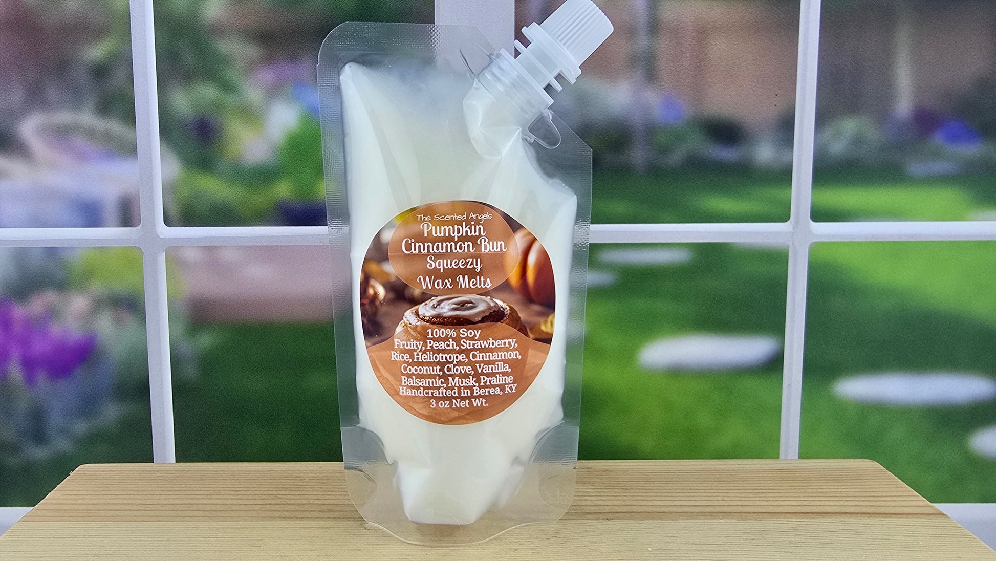 Pumpkin Cinnamon Bun handmade wax melts by The Scented Angels in clamshell and Squeeze Wax™, featuring cinnamon, clove, vanilla, praline, coconut, and warm bakery-inspired notes.