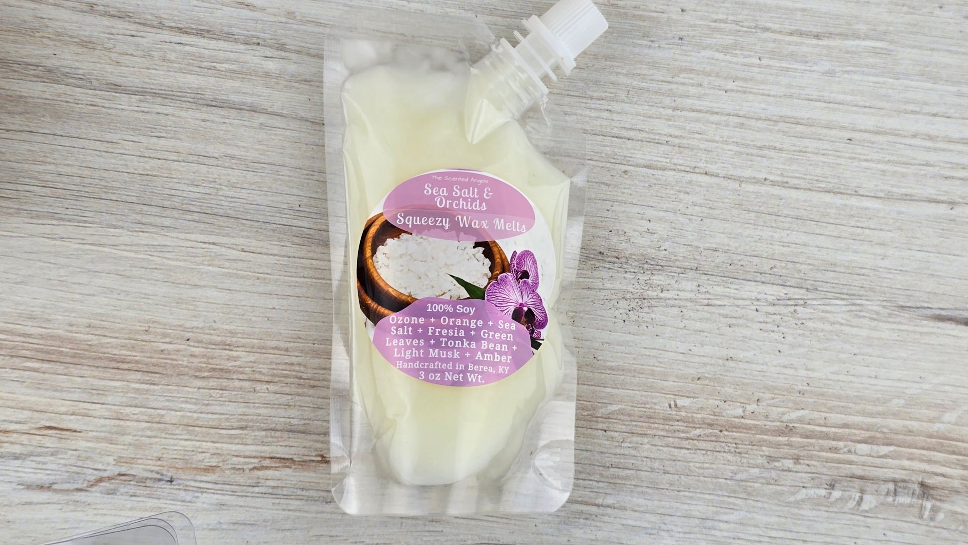 squeezable wax pouch front laying down