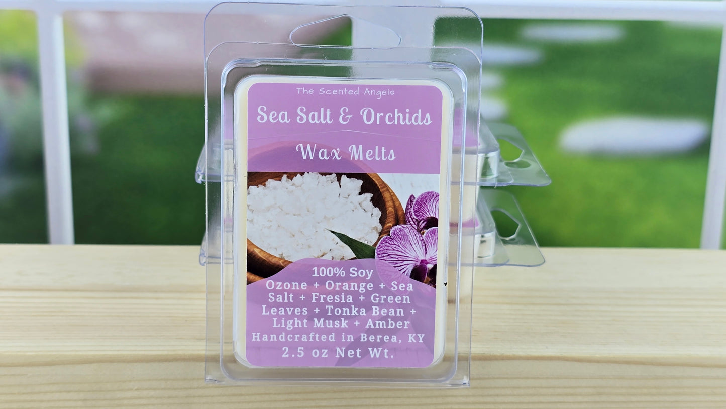 Sea Salt & Orchids wax melt packaging on a wooden surface with a blurred outdoor background