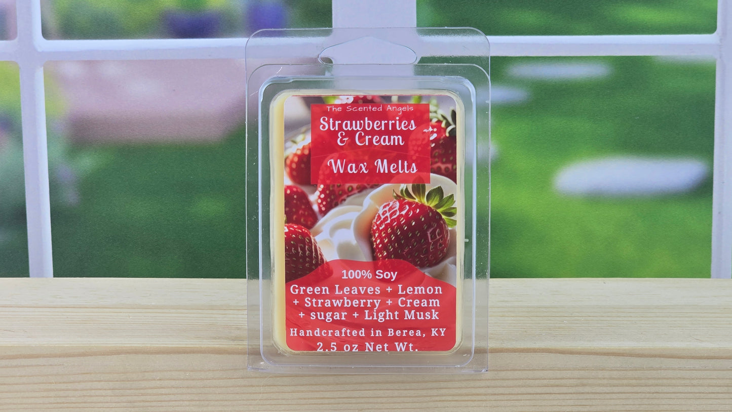 Strawberries & Cream wax melts packaging on a wooden surface with a blurred outdoor background