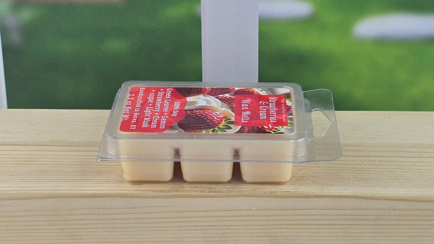 packaged strawberries and cream wax melts n a wooden surface