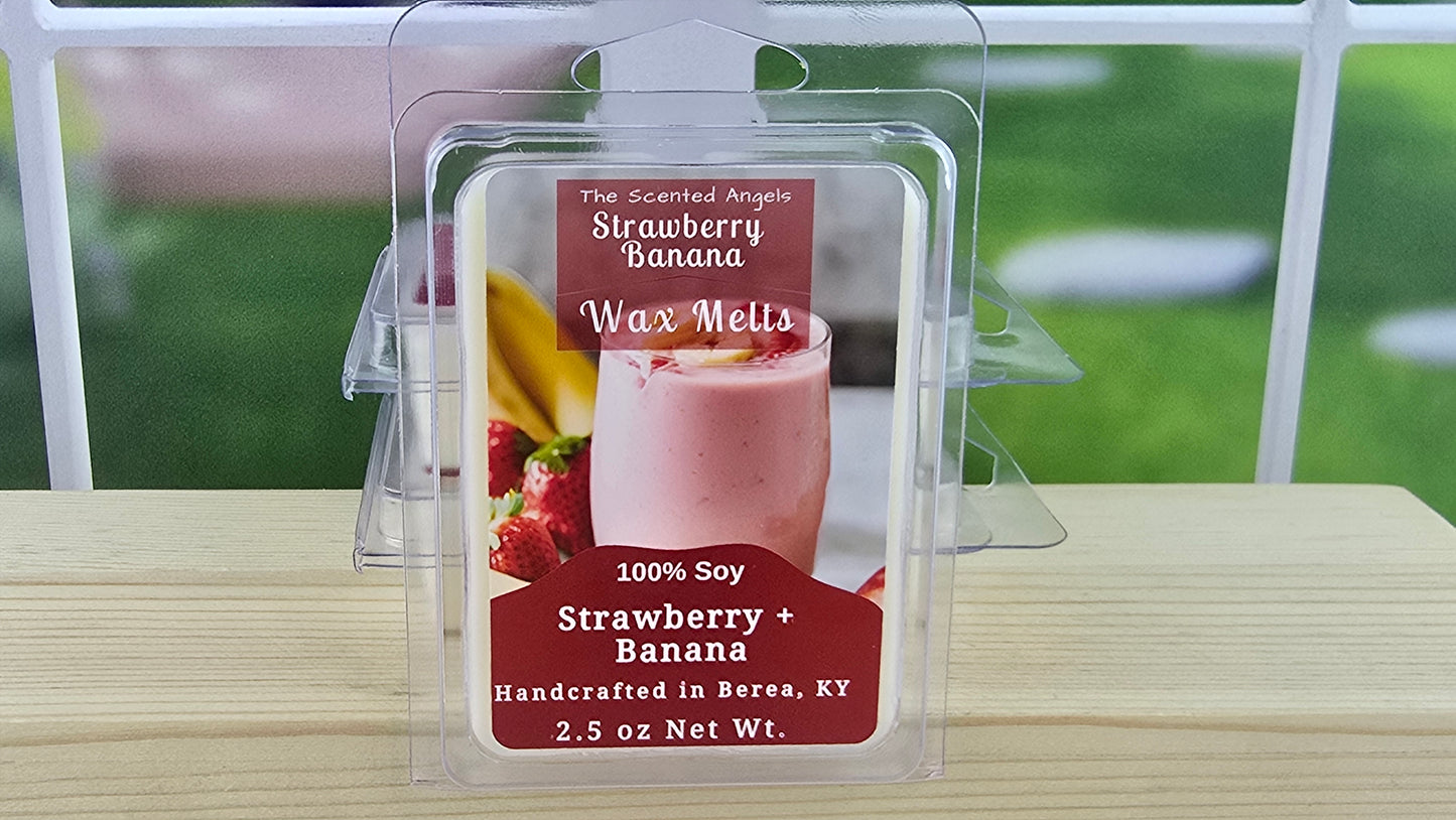 Strawberry Banana wax melt packaging on a wooden surface with a blurred outdoor background