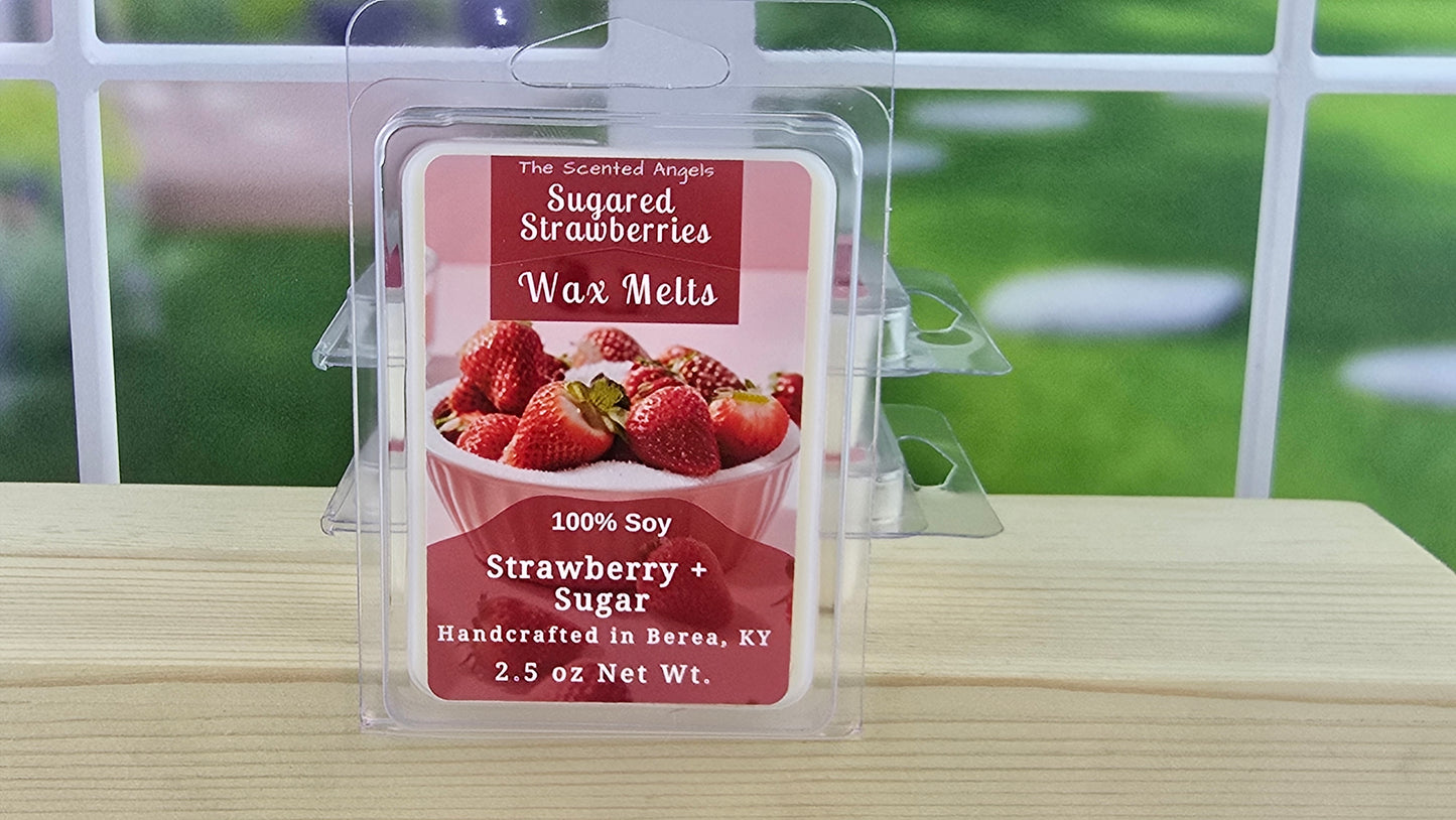 Packaged wax melts with strawberry and sugar flavor on a wooden surface.