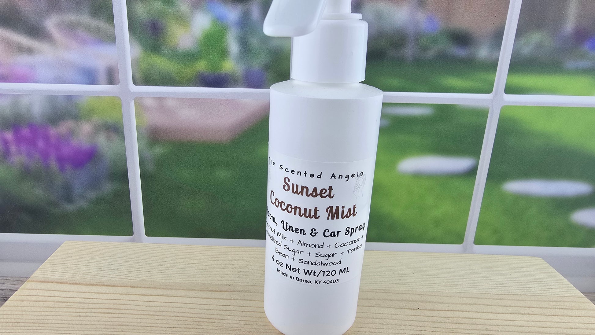 Sunset Coconut Mist Odor Eliminating Spray up close of front label